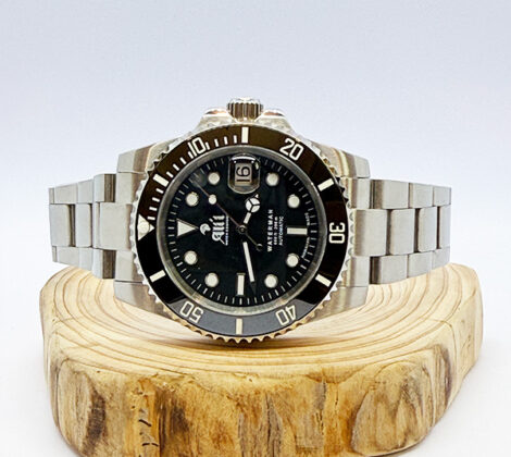 Waterman 41MM Black Dial Black Bezel Sports Watch sits on a piece of wood