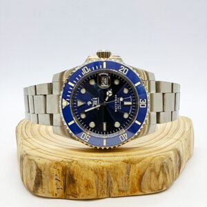 Waterman 41MM Blue Dial Blue Bezel Sports Watch sits on a piece of wood