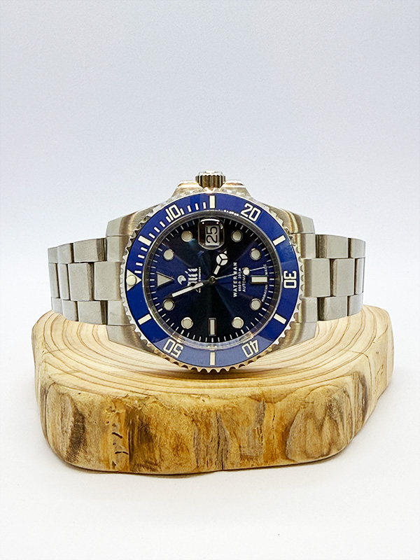Waterman 41MM Blue Dial Blue Bezel Sports Watch sits on a piece of wood