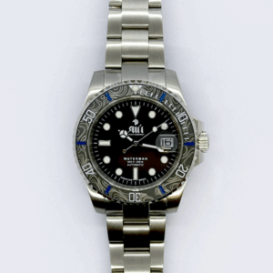 Front view of the Ali'i Watch Company Waterman watch with black dial and black carbon fiber bezel with blue minute markers.
