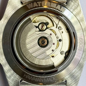 The display back on the Ali'i Watch Company Waterman watch shows the mechanical movement and lists the depth rating of 660 feet or 200 meters.